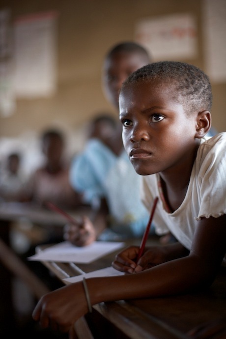 Child learning hard at school in Kenya