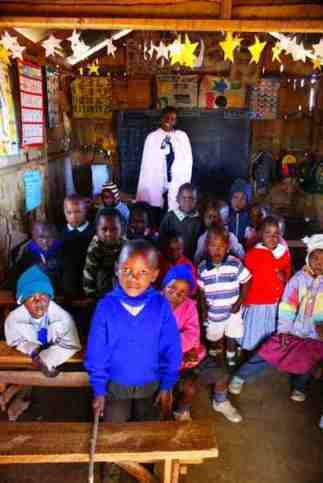 School and the teacher all in for a group photo
